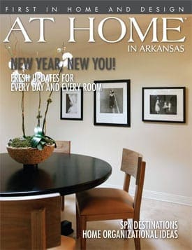 At Home magazine cover featuring framed photos and a table setting.