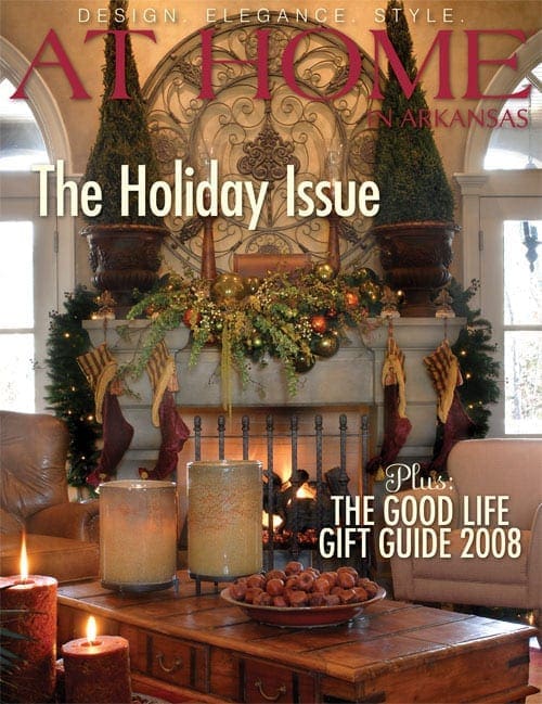 At Home magazine cover featuring a fireplace with garland and stockings.