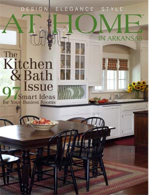 At Home in Arkansas magazine cover featuring a white kitchen and dining area.