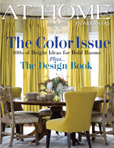 At Home in Arkansas magazine cover featuring yellow drapes and furniture.