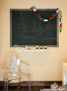 Blackboard with a Christmas tree drawing and ‘Merry Christmas’ text.