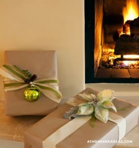 Brown gift boxes with festive ribbons and ornaments.