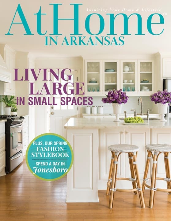 AtHome magazine cover featuring a white kitchen with island and floral accents.