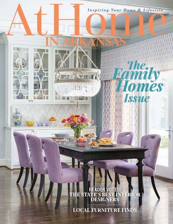 AtHome magazine cover featuring a dining room with purple chairs and a patterned wallpaper.