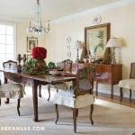 Formal dining room with dark wood table, chairs, and sideboard.