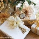 Gold bows and gifts with a crown emblem.