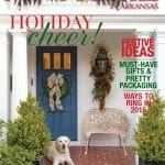 At Home Arkansas holiday issue cover featuring a porch, dog, and festive decorations.