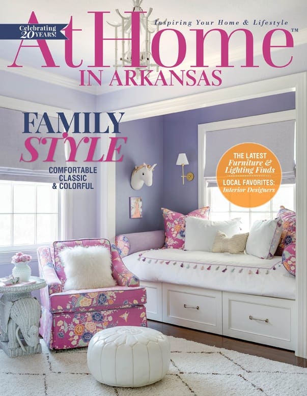 At Home in Arkansas magazine cover with text 'Family Style' and floral furniture.