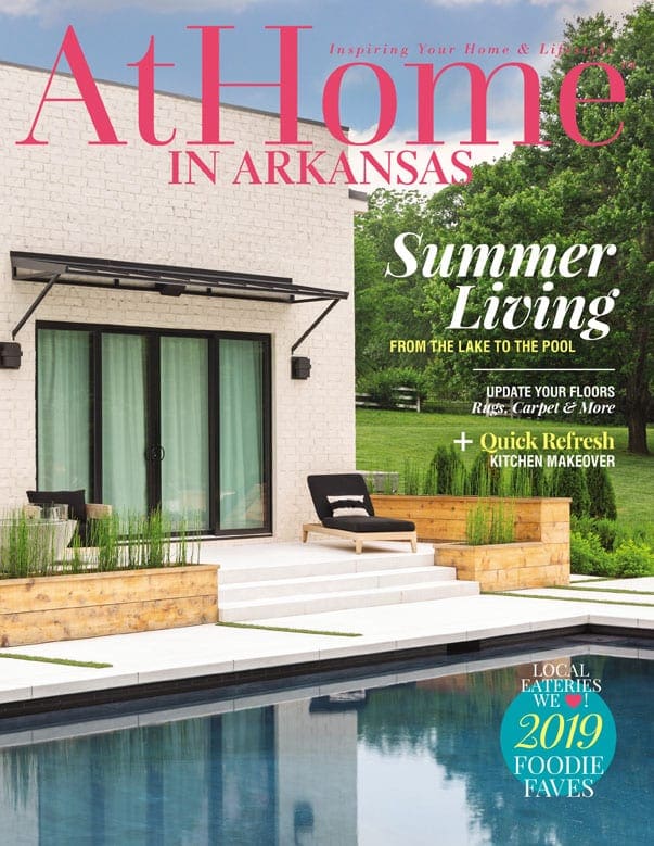 At Home In Arkansas magazine cover with "Summer Living" headline and pool scene.