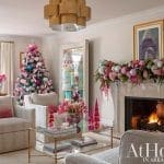 Living room with Christmas tree, fireplace, and nutcracker decor