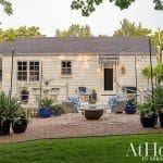 Light-colored house with porch and string lights, Arkansas