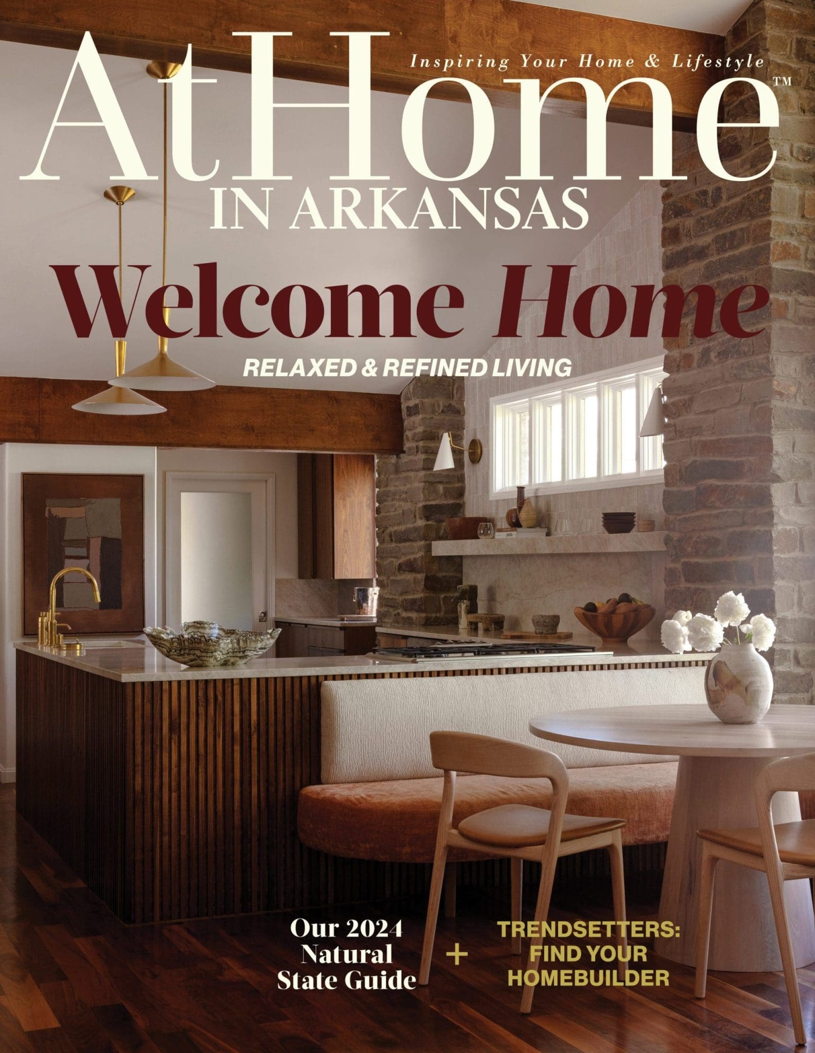 At Home Arkansas magazine cover featuring a stone kitchen.