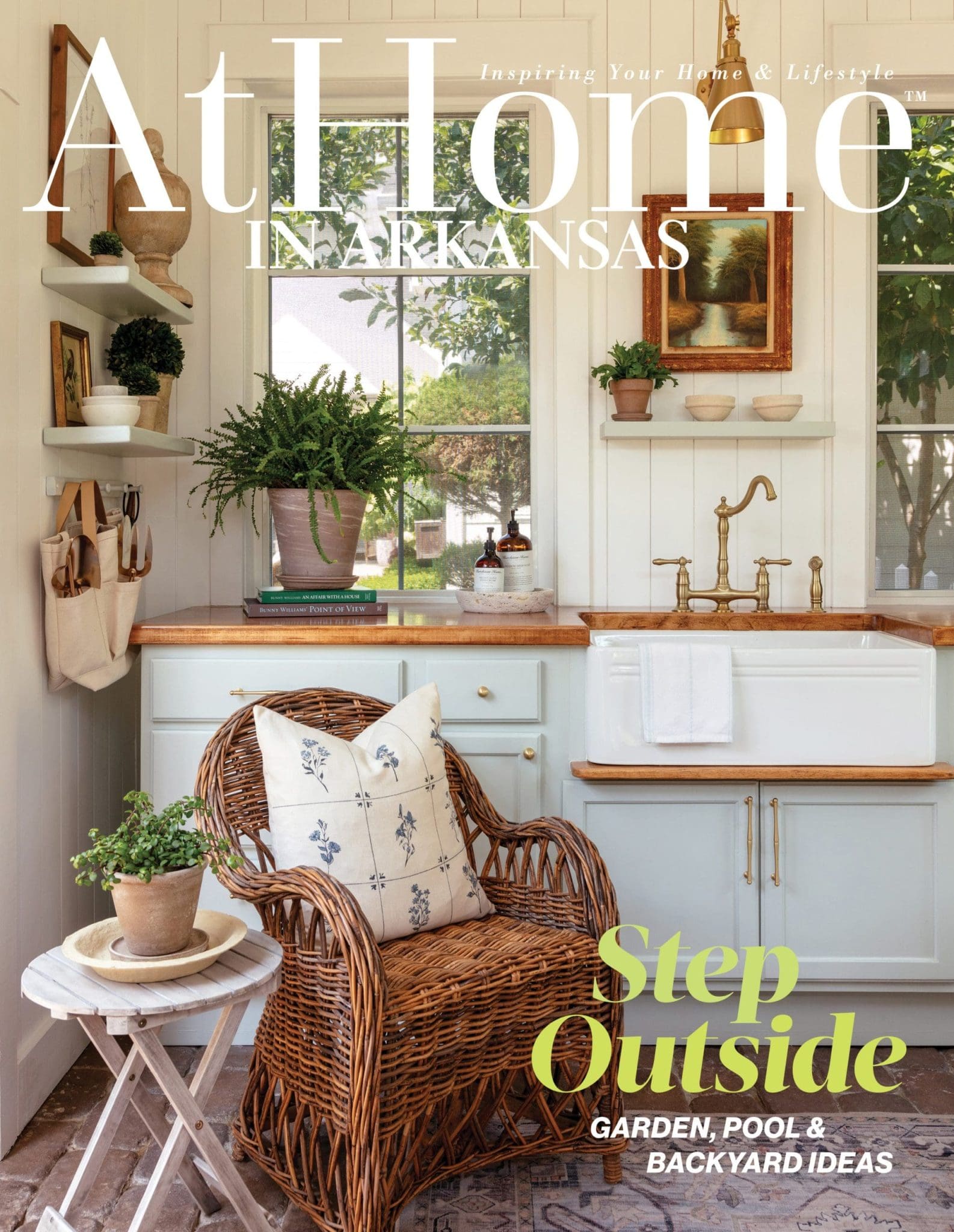 At Home In Arkansas magazine cover with "Step Outside" headline.