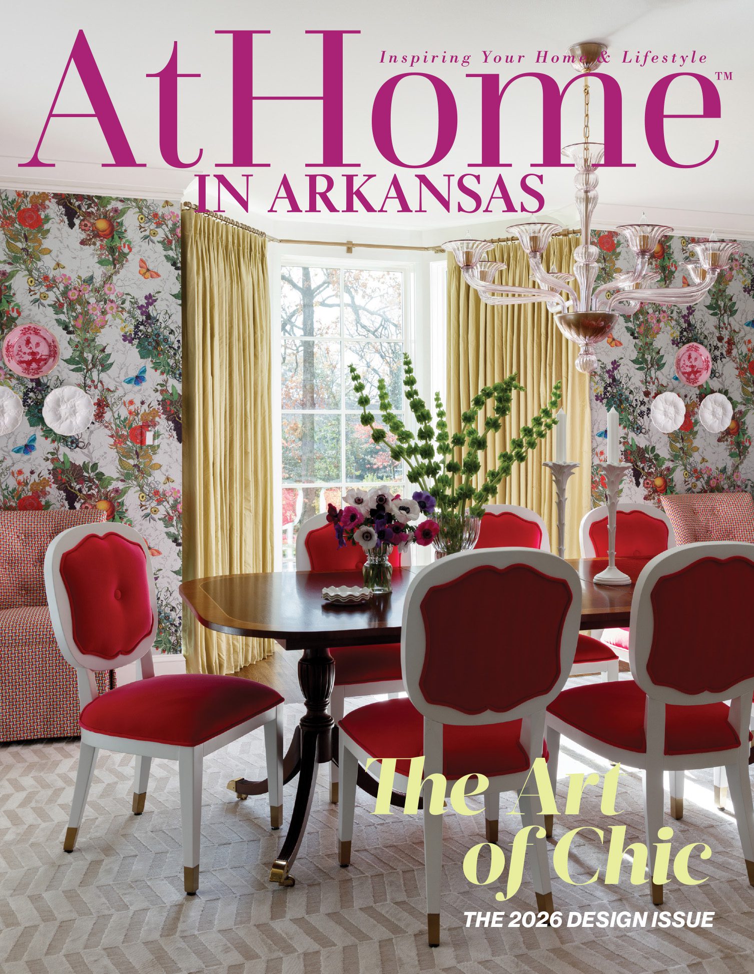 AtHome in Arkansas magazine cover featuring a dining room with red chairs, floral wallpaper, and