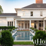 AtHome in Arkansas magazine cover with white house and pool