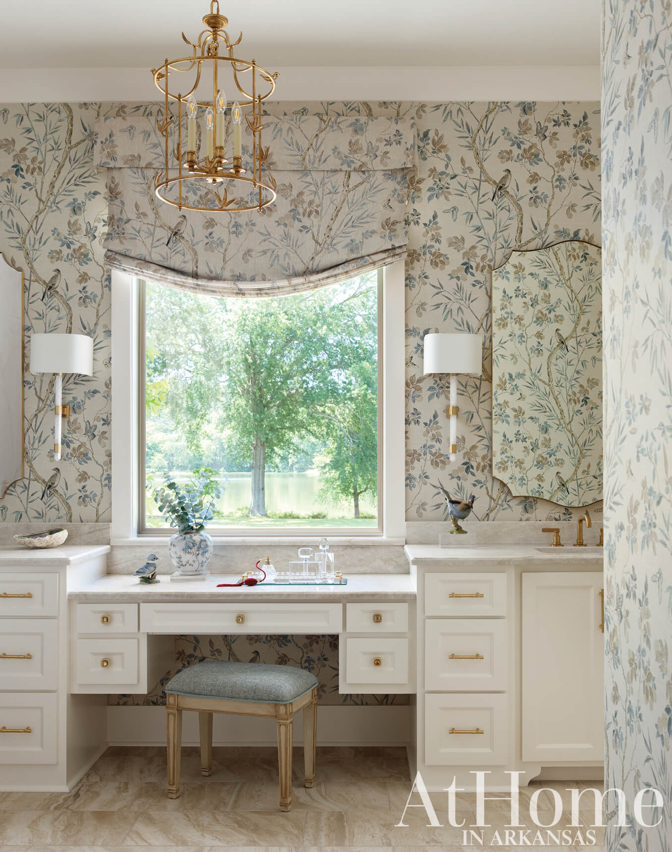 Bathroom with floral wallpaper, window, and vanity.
