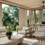 Wooden slat covered outdoor patio with seating.