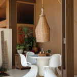 Woven pendant light and outdoor dining set in Arkansas.