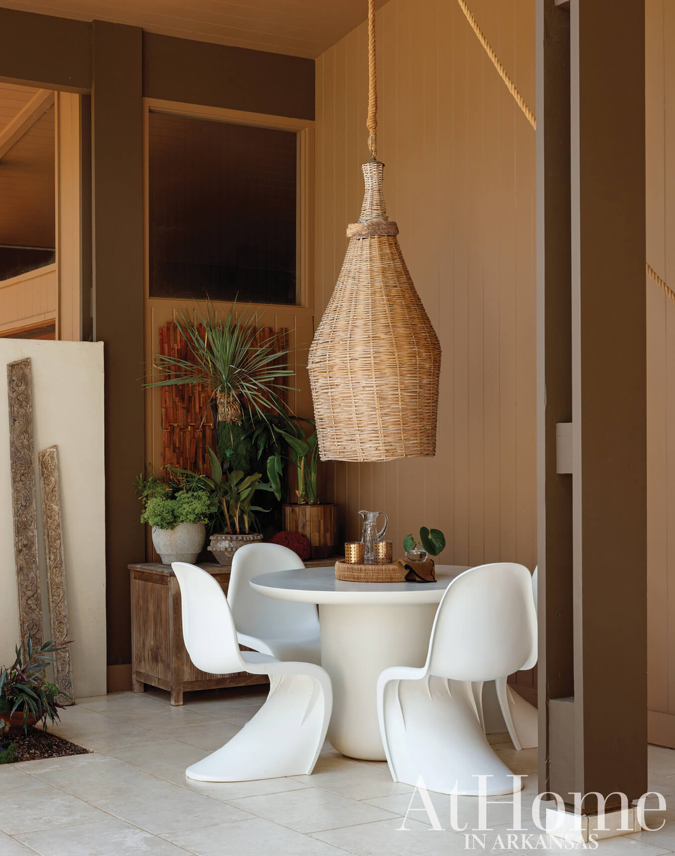 Woven pendant light and outdoor dining set in Arkansas.